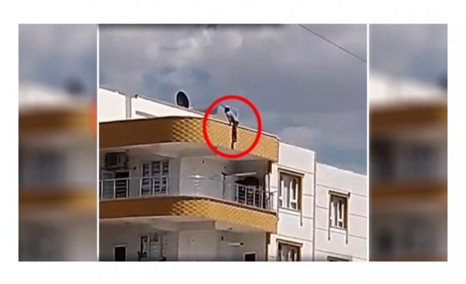 Siverek'te 3 katlı binanın çatısına çıkan genç intihar etmek istedi